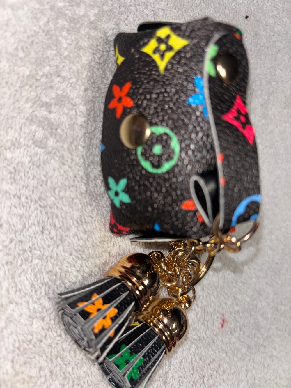 Black Mini Bag Key Pouch with Multicolor Motif and Gold Tassels